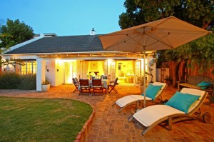 Hout Bay Beach Cottage _16_ medium size_patio dusk
